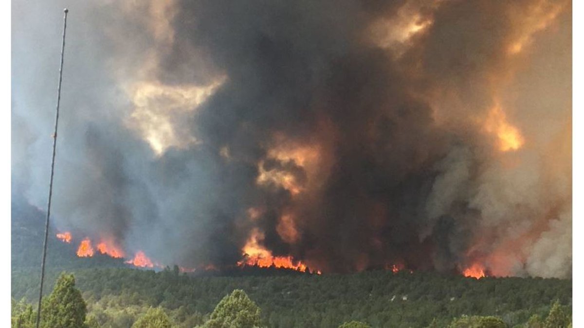 Firefighters continue to battle a lightning-caused fire in southeast Utah County.