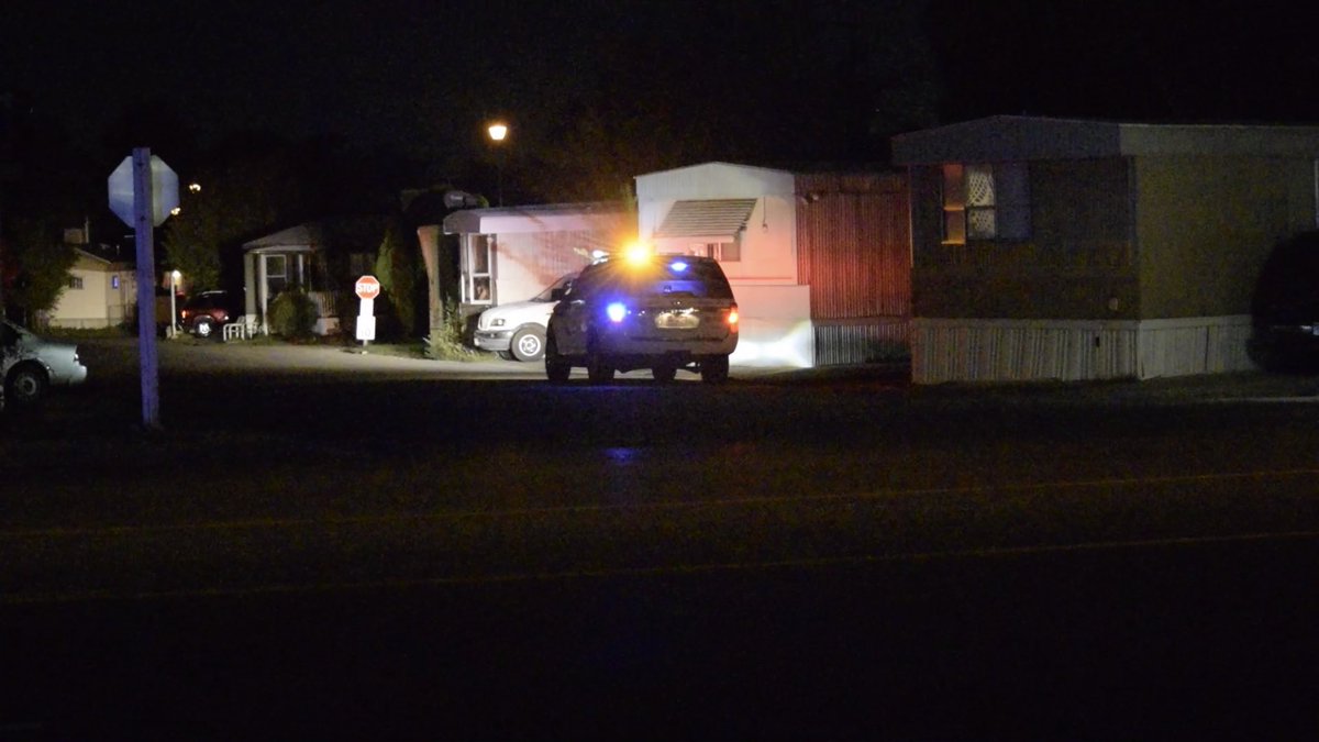 Police are looking for the male suspect who broke into a mobile home near 3400 South and 4240 West and allegedly threatened two people with a knife before fleeing into the night.