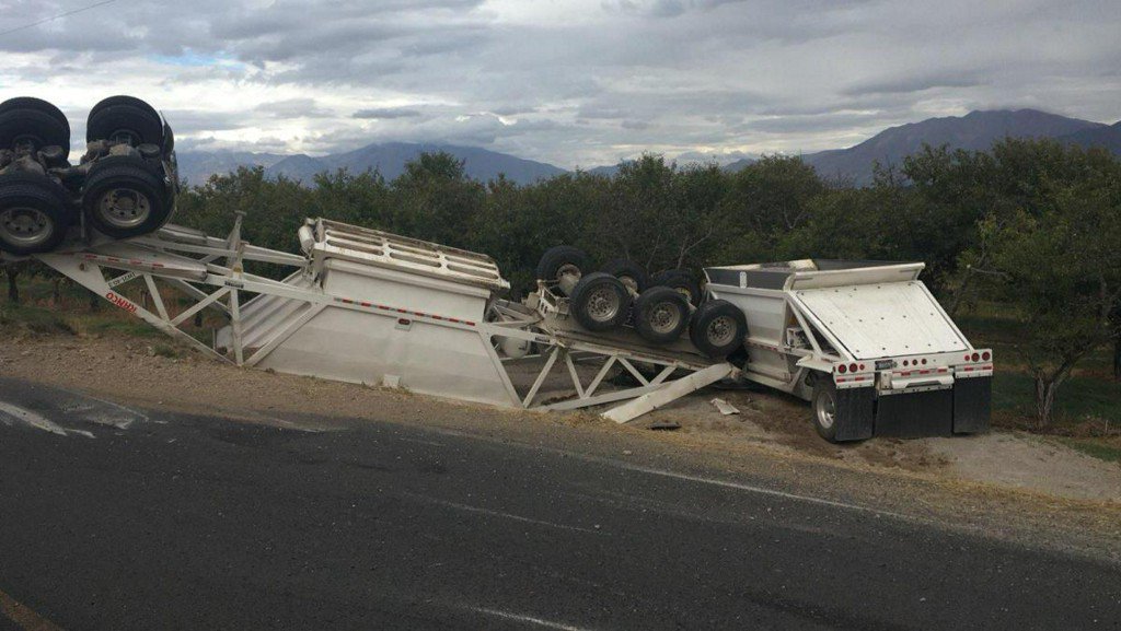 Driver of gravel truck cited after rolling into orchard in Utah County, spraying 'tons' of gravel    