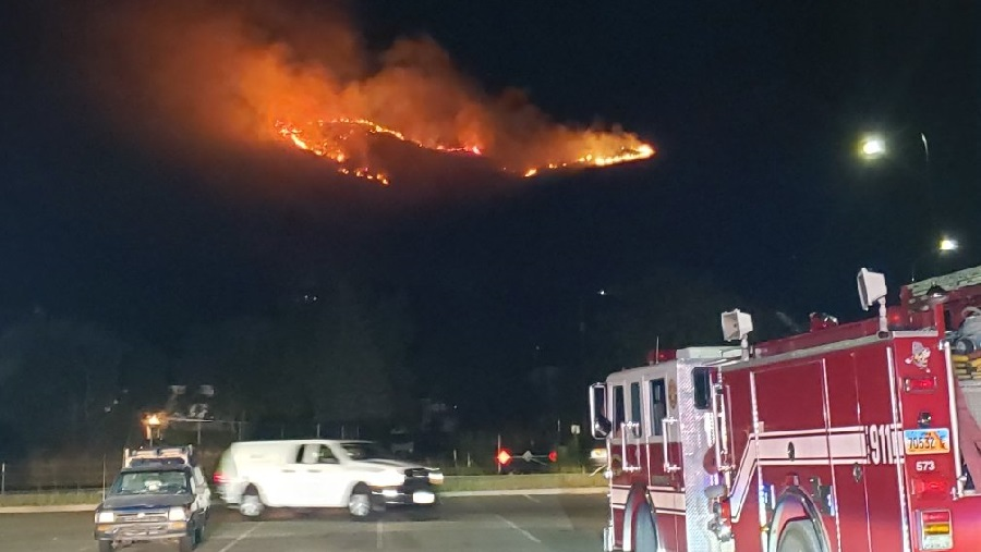 Firefighters are responding to a brush fire near U.S. Highway 89 and Antelope Drive in Layton. The fire in the foothills east of the city was first reported around 10 p.m. Monday night.