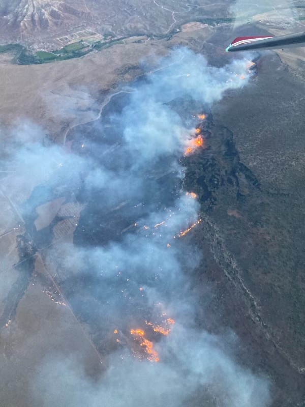 Multiple fire crews are working a massive fire spanding 600-700 acres in Washington County