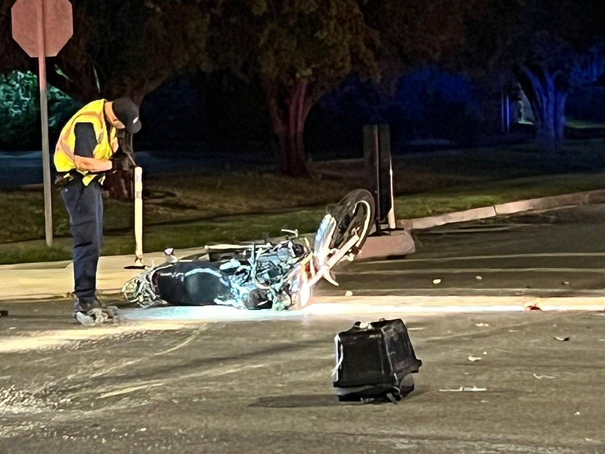 SaltLakePolice investigators on the scene of a hit & run motorcycle crash at 400 E 2100 S. Rider taken to an area trauma center in extremely critical condition.   