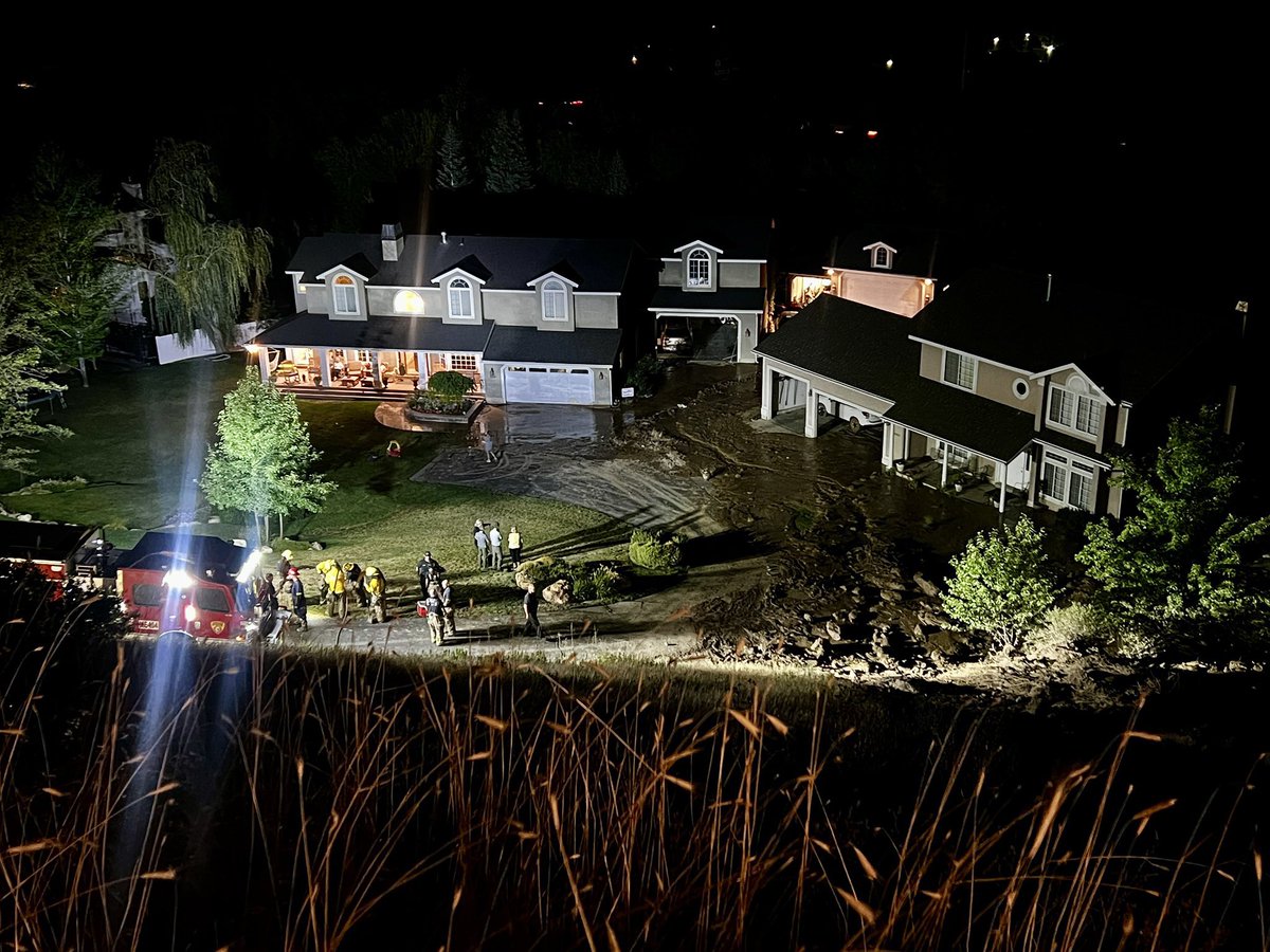 A water line break east of I-215 at 3100 S caused a mud slide after 8pm tonight. 3 homes evacuated, 1 with significant mud in the basement. No injuries reported. Water was shut off for cleanup, and crews assisted with diking the mud flow 