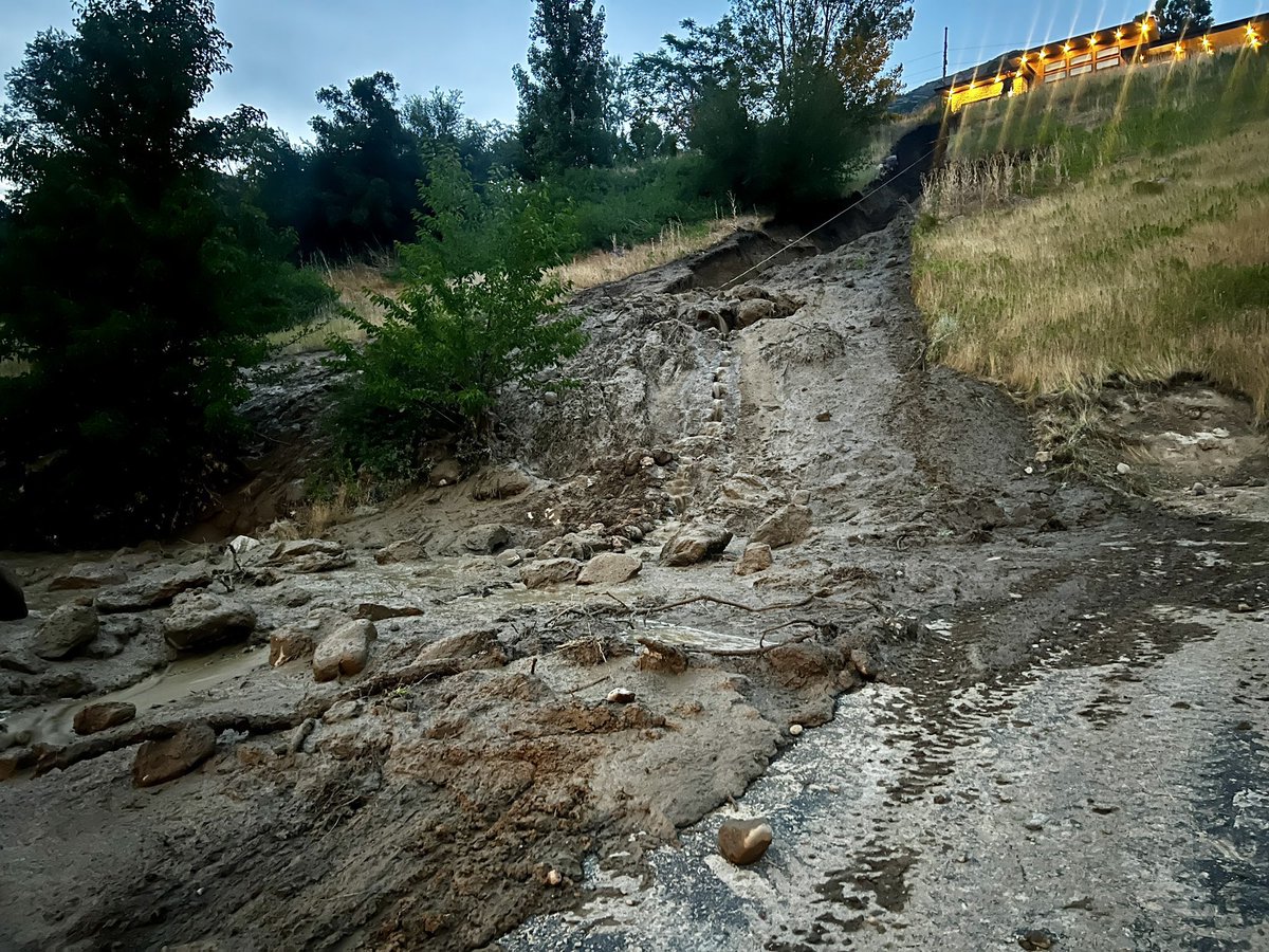 A water line break east of I-215 at 3100 S caused a mud slide after 8pm tonight. 3 homes evacuated, 1 with significant mud in the basement. No injuries reported. Water was shut off for cleanup, and crews assisted with diking the mud flow 